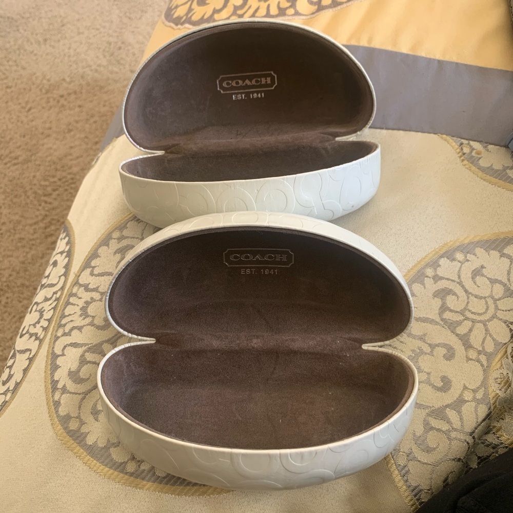 Empty Coach sunglasses case white